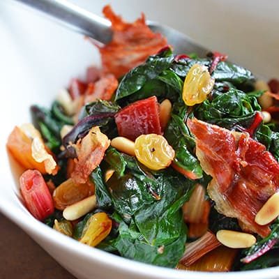 Swiss Chard with Raisins, Pine Nuts, and Crispy Prosciutto