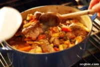 Deeply Flavorful Oven-Braised Beef Stew with Winter Greens and Roots