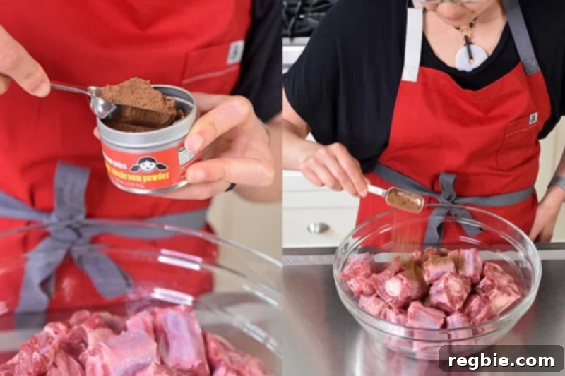 A bowl filled with oxtails is seasoned with a tablespoon of Magic Mushroom Powder. 