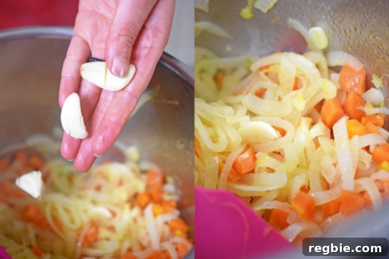 Smashed cloves of garlic are added to carrots and onions sautéing in an Instant Pot.