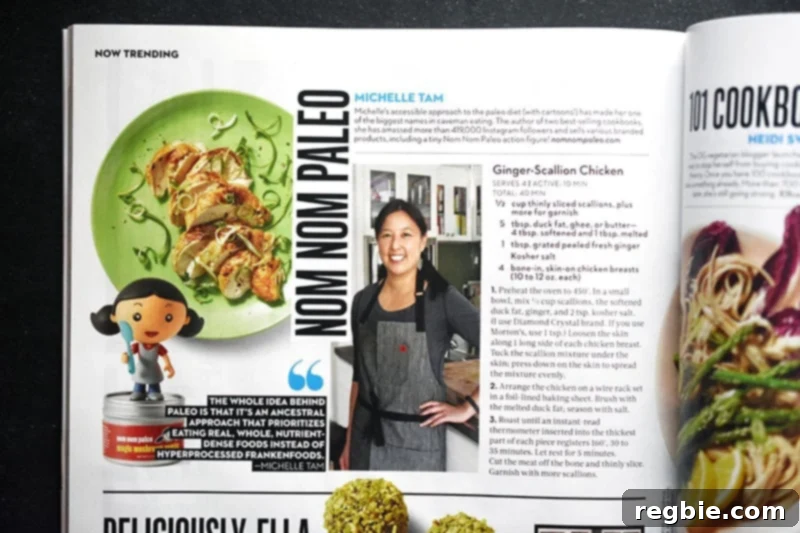 A shot of a Rachael Ray Every Day magazine opened up to a feature article on Nom Nom Paleo, highlighting the Ginger Scallion Chicken recipe.