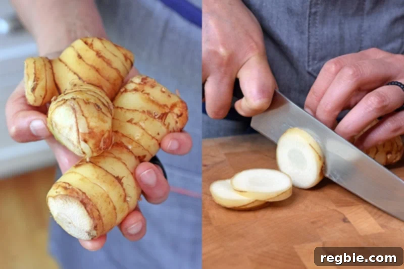 Fresh galangal root being held in a hand and sliced on a cutting board, an essential aromatic for Tom Kha Gai.
