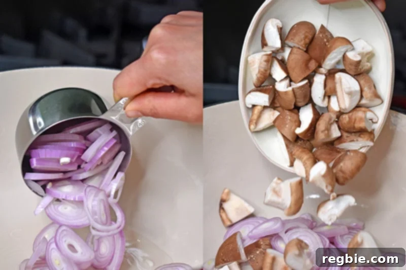 Adding sliced shallots and quartered shiitake mushrooms to a pot to begin making Whole30 and keto Tom Kha Gai.