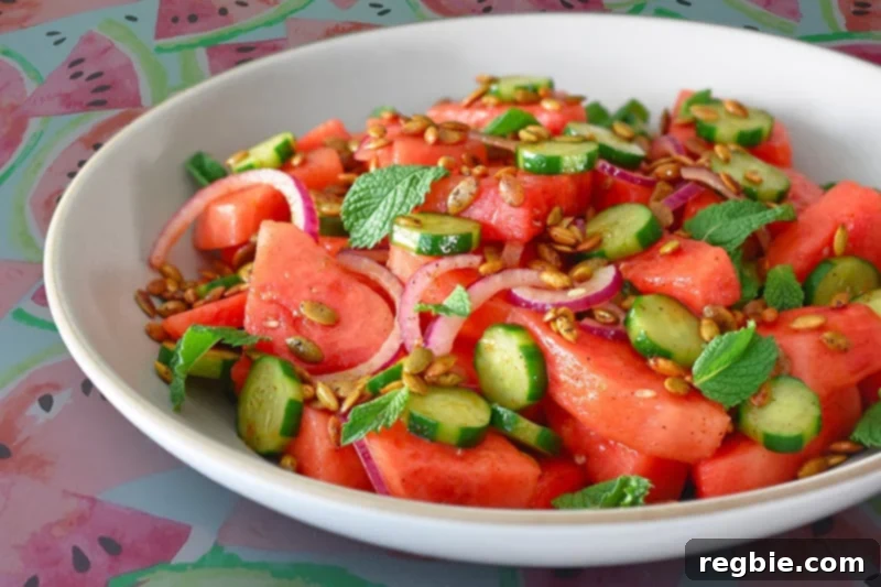 Fiesta Watermelon Cucumber Salad 11 A beautifully presented bowl of paleo and Whole30 Mexican watermelon salad, glistening and ready to eat.