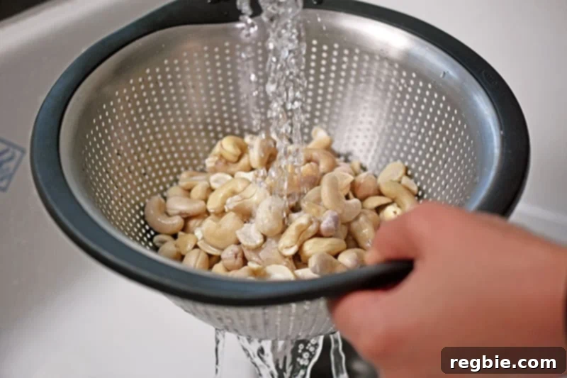 Rinsed and drained soaked cashews, ready for blending into the vegan, No-Bake Matcha Cheesecake filling.