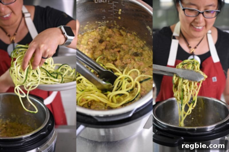 Raw zucchini noodles being added directly to hot Instant Pot Zucchini Bolognese to gently heat and soften before serving, absorbing all the flavors.