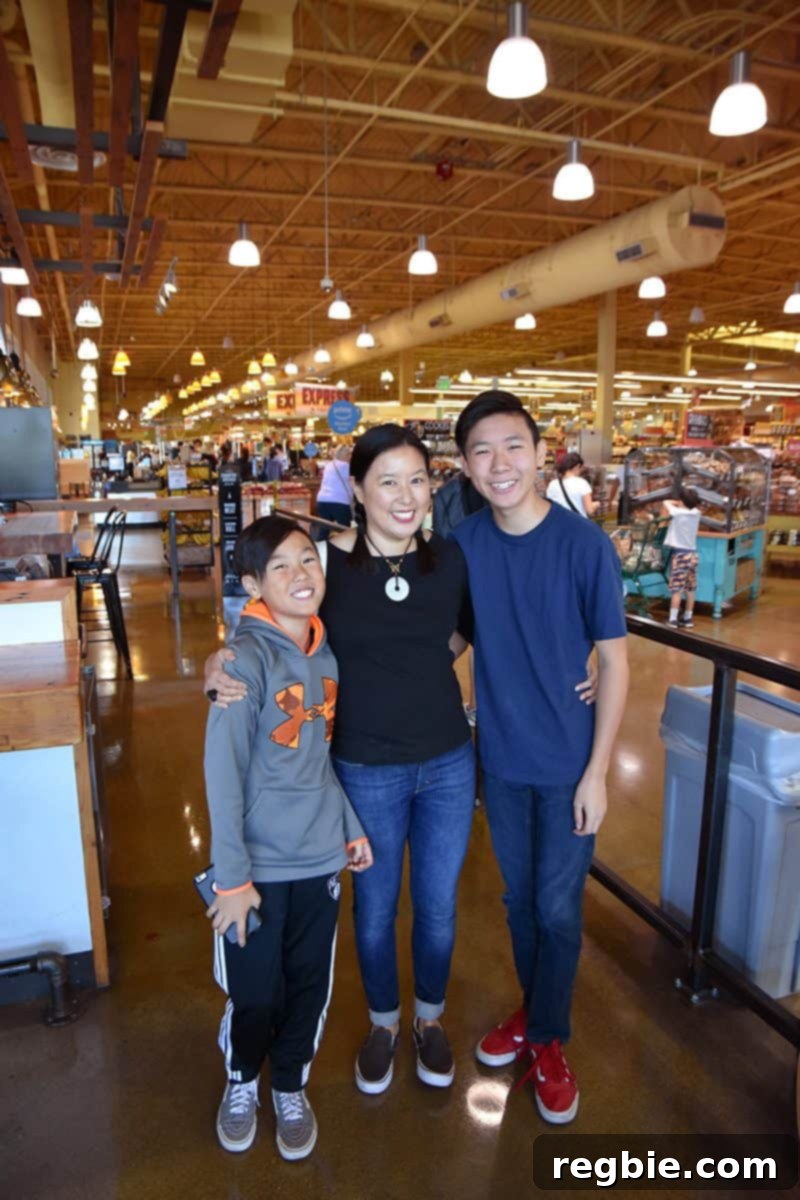 Whole Foods Grilling Mastery 15 Michelle Tam smiling and enjoying grilled food outdoors