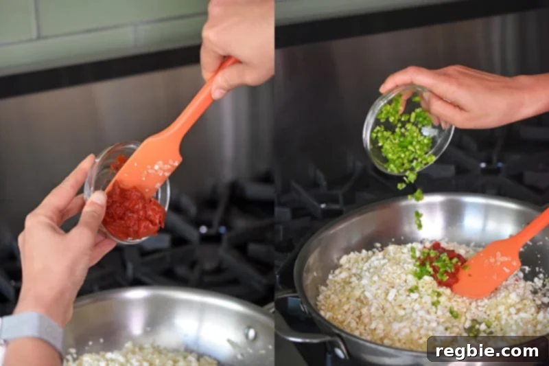 Tomato paste and diced jalapeño peppers are being added to the riced cauliflower mixture, forming the core of healthy Mexican Cauliflower Rice.