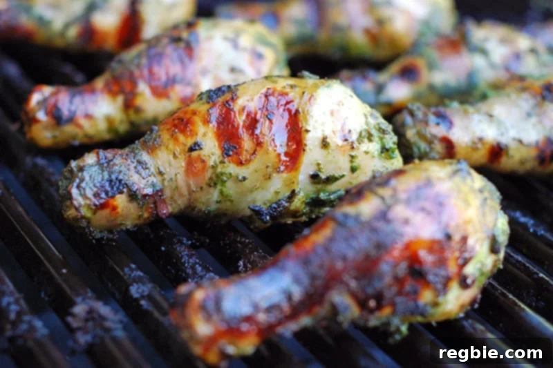 A delicious close-up shot of Fiona’s Phenomenal Grilled Green Chicken, showcasing its crispy, herb-infused skin.
