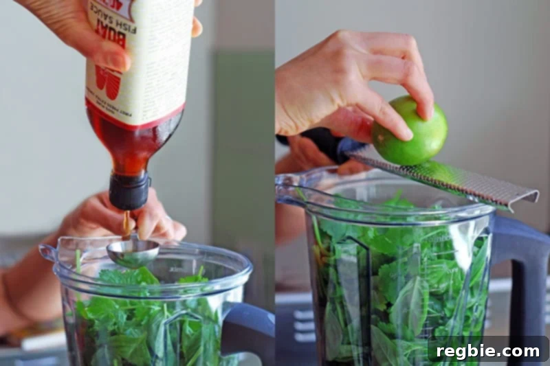 Adding Red Boat fish sauce and fresh lime zest to the blender with other marinade ingredients for Green Chicken.