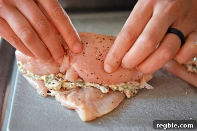 Delectable Prosciutto Chicken Rolls 9 A flattened chicken breast is carefully rolled around its seasoned mayonnaise filling, forming a neat and compact cylinder. This pivotal step ensures the flavorful core is perfectly encased, contributing significantly to the involtini's elegant presentation and delicious, consistent taste.