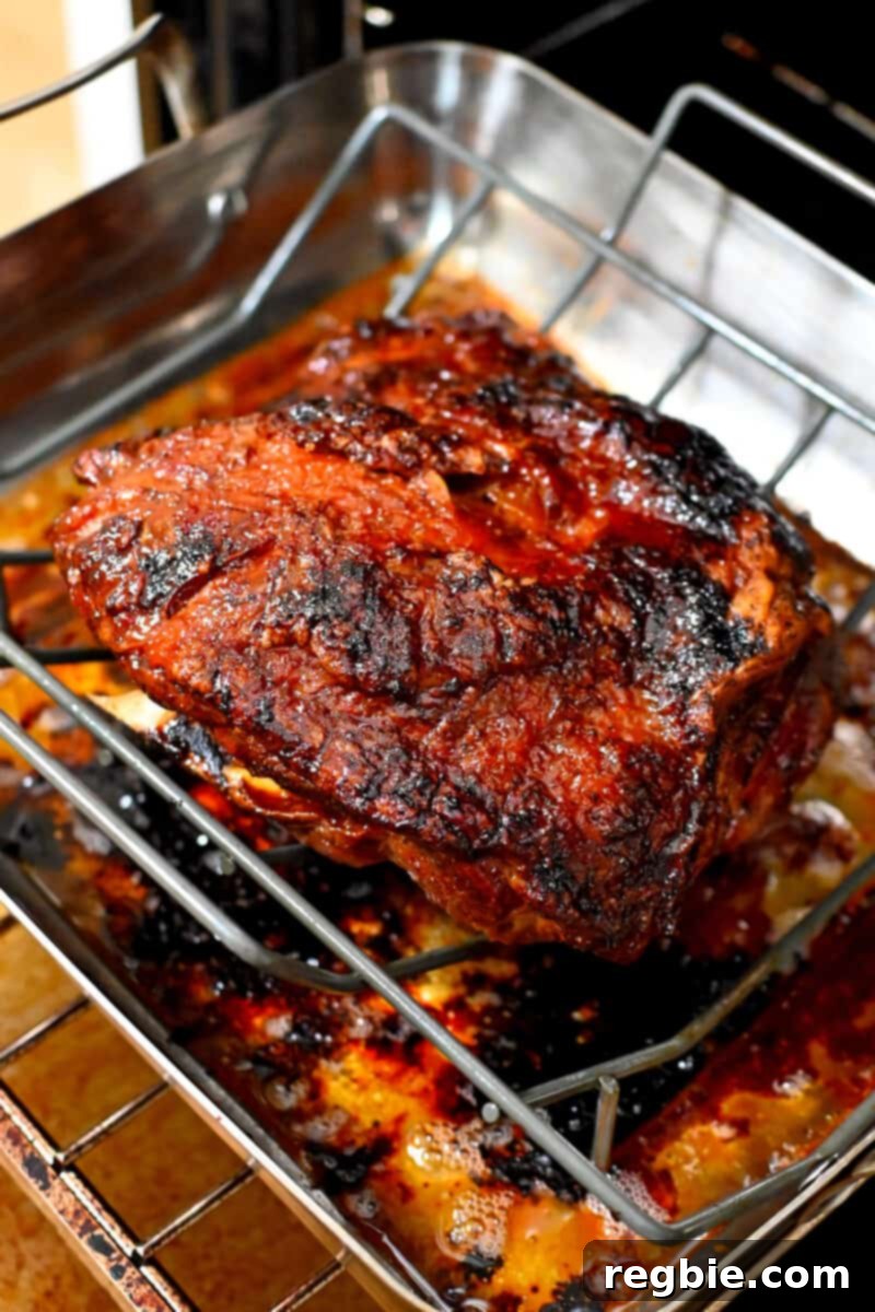 Effortless Peach Glazed Pork Roast 13 An overhead shot of a slow roasted pork shoulder roast right out of the oven.