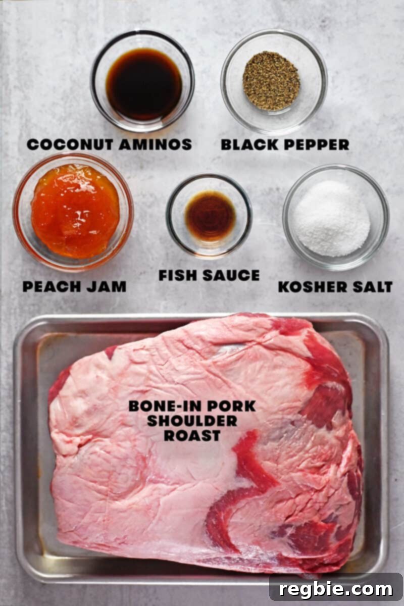 Effortless Peach Glazed Pork Roast 3 An overhead shot of the raw ingredients to make a pork shoulder roast in the oven.