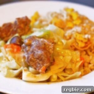 A plate of braised thai green goat curry.