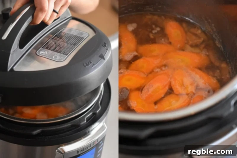 The Instant Pot is opened, revealing perfectly cooked sliced carrots floating on top of the fragrant Vietnamese Pork Stew cooking liquid.