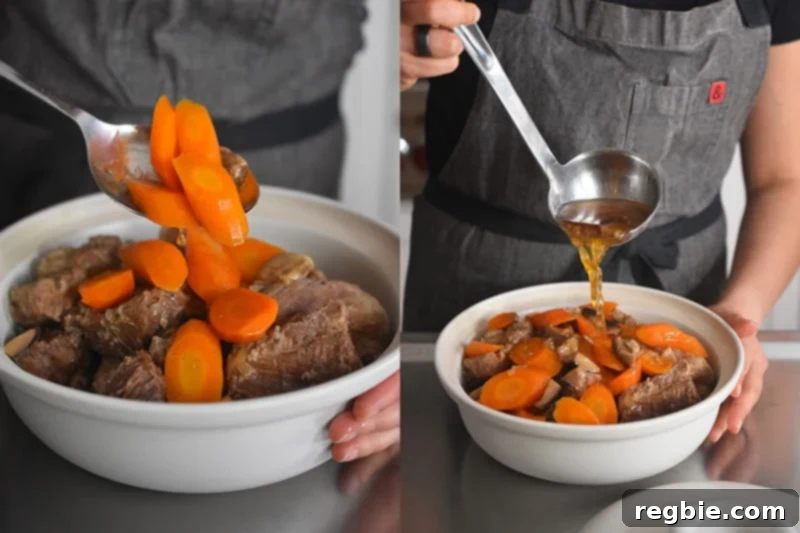 The cooked carrots and aromatic cooking liquid are being spooned on top of the reserved, tender pork.