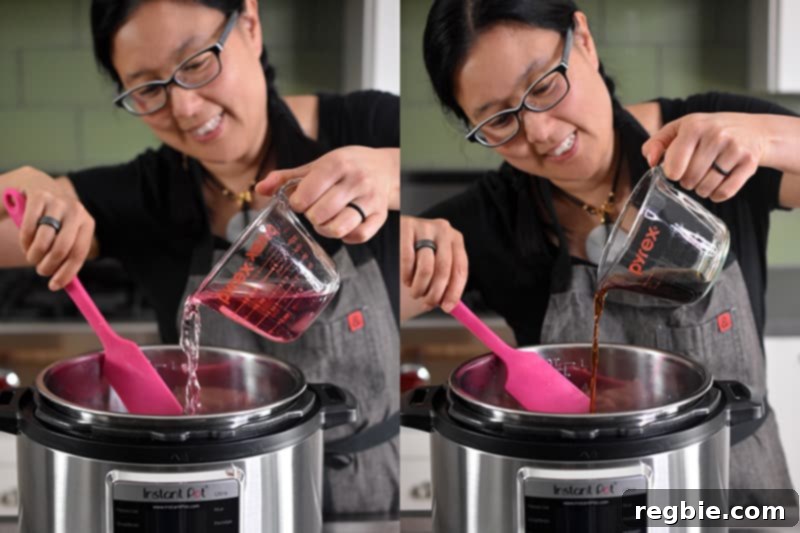A smiling Asian woman with glasses is pouring pink coconut water into an open Instant Pot, followed by fish sauce.