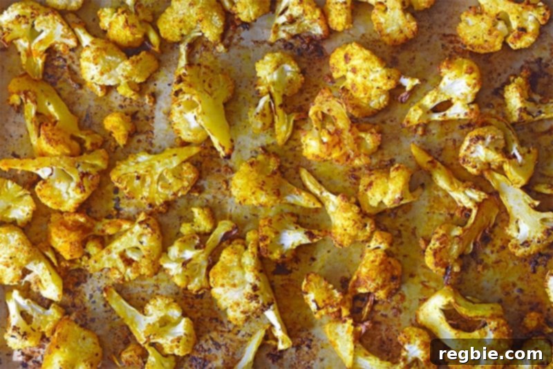 Simple Whole30 Roasted Vegetable Creations 4 An overhead shot of Roasted Curried Cauliflower fresh from the oven.