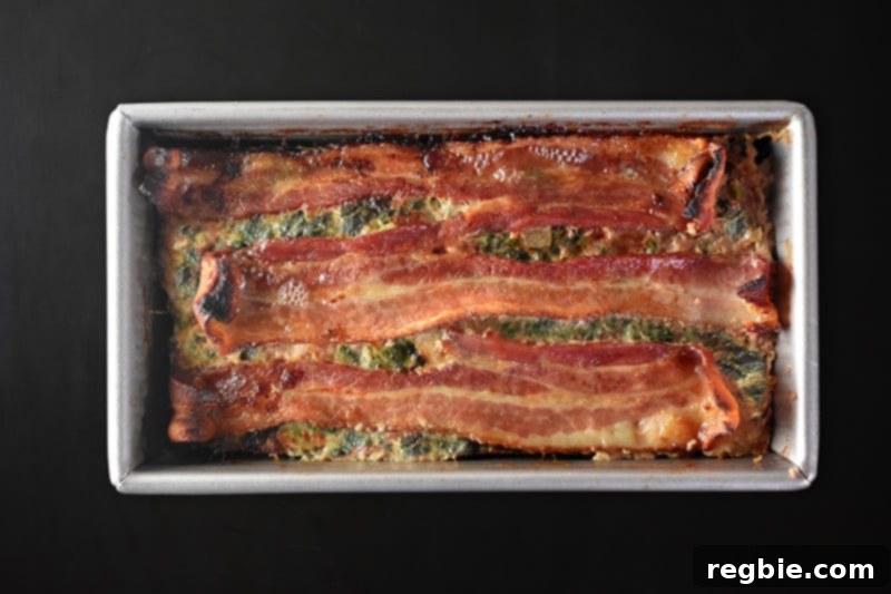 Easy Whole30 Paleo Keto Meatloaf Nut and Dairy Free 12 An overhead shot of the Easy Meatloaf, fresh from the oven with perfectly crispy bacon on top, indicating it's ready for resting.