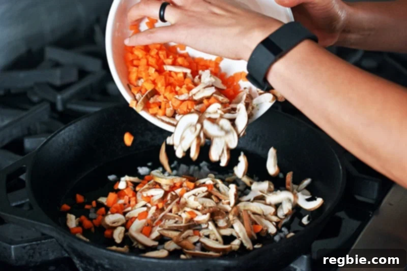 Photo of fresh, colorful stir-fry ingredients sizzling in a hot skillet, ready for the sauce.