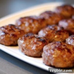 A close-up of beautifully seared Sous Vide Umami Slider Burgers.