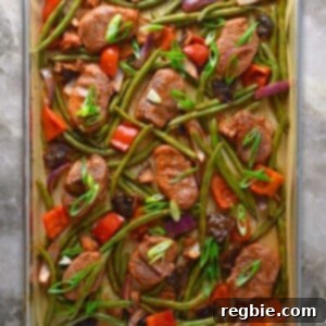 Sticky Sweet and Spicy Sheet Pan Pork 16 An overhead shot of Sheet Pan Sweet and Spicy Pork on a marble countertop.