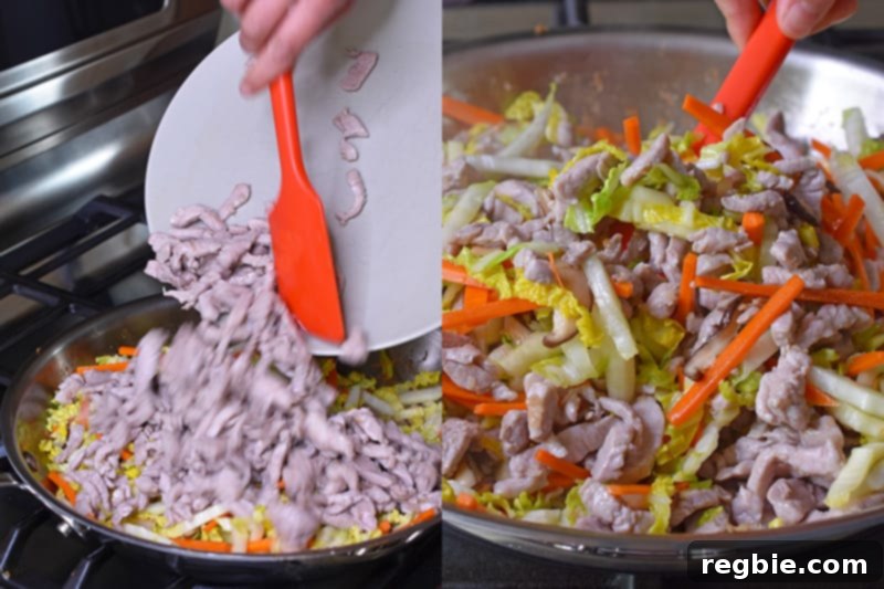 Adding the cooked pork back into the skillet with the vegetables. 