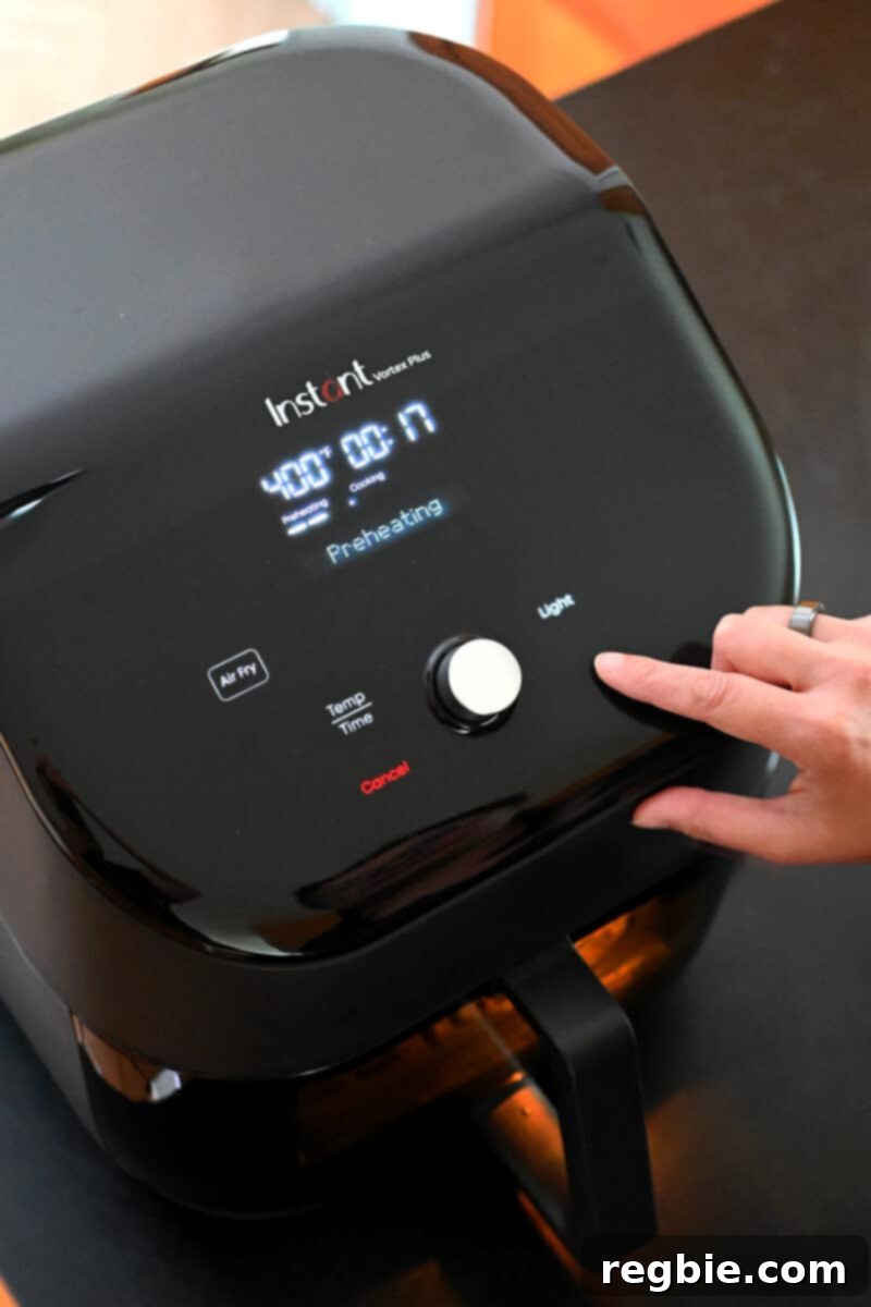 Ultimate Crispy Air Fryer Chicken Thighs 3 A top-down view of the Instant Pot Vortex Plus with ClearCook Cooking window, showing its sleek design and cooking basket.