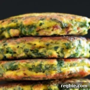 A stack of paleo egg foo young against a black background