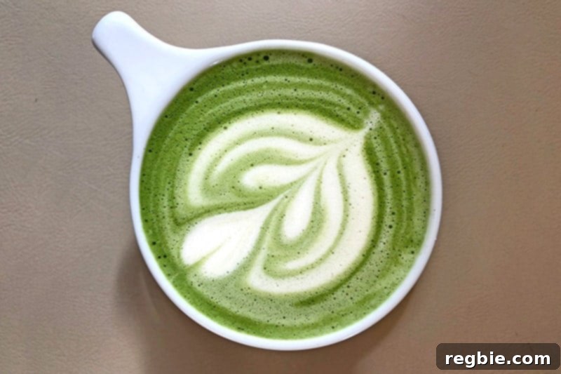 Chilled Matcha Infusion 4 A close-up shot of vibrant green matcha powder, highlighting its fine texture and rich color.