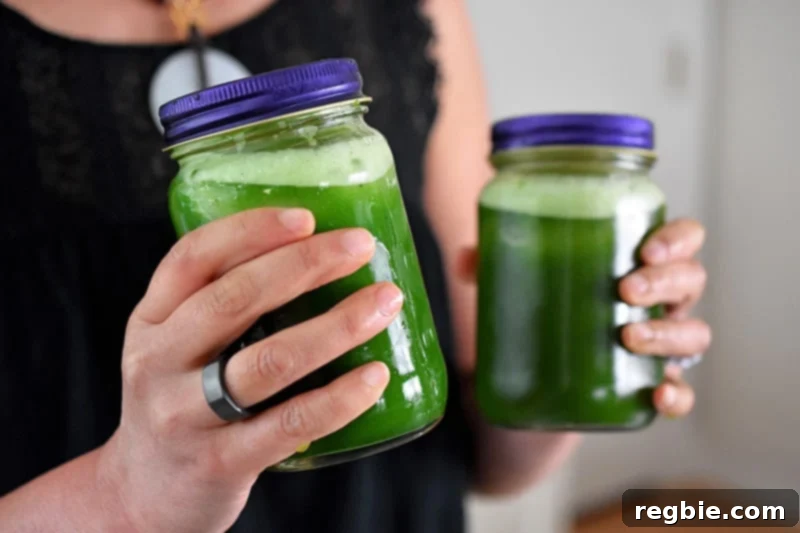 Chilled Matcha Infusion 10 Two sealed mason jars filled with freshly shaken bright green cold brew matcha, showcasing the successful mixing.