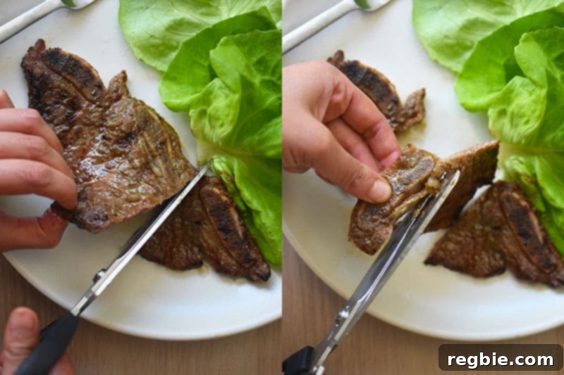 Classic Korean BBQ Kalbi 15 Someone using kitchen shears to cut up paleo kalbi.