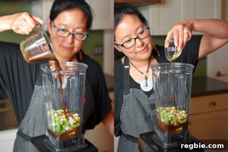 Classic Korean BBQ Kalbi 8 An Asian woman is adding All-Purpose Stir-Fry Sauce and toasted sesame oil to a blender to make Whole30 and paleo Korean BBQ short ribs marinade