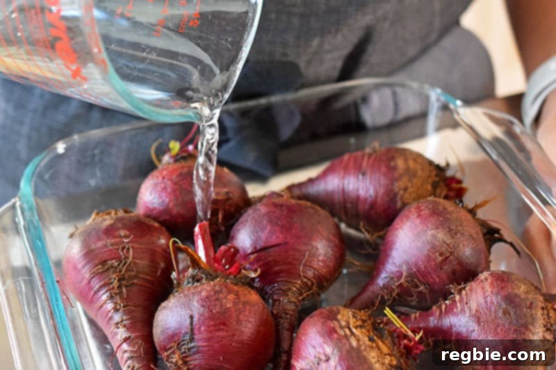 Sweet and Tangy Roasted Beets 7 Covering the baking dish with aluminum foil for roasting marinated beets.