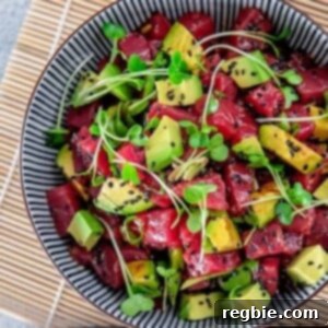 An overhead shot of a big bowl of paleo tuna poke with avocado.
