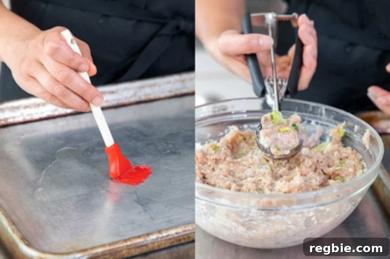 Brushing avocado oil onto a rimmed baking sheet before scooping the tsukune meatballs onto it for broiling.
