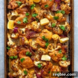 An overhead shot of healthy and easy sheet pan Chicken tandoori, a Whole30 and keto-friendly dinner!