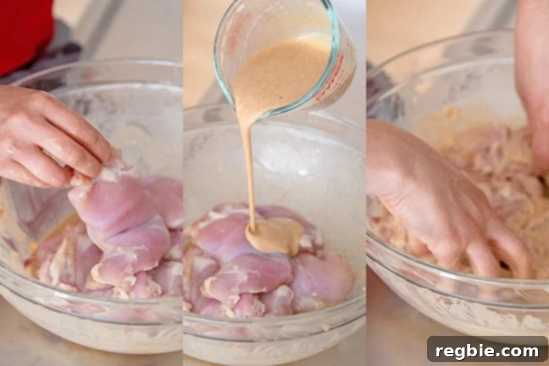 Pouring keto tandoori marinade on boneless skinless chicken thighs and tossing them well.