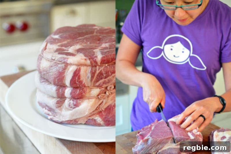 Cutting a bone-in pork shoulder roast into three large pieces, preparing it for the Instant Pot.