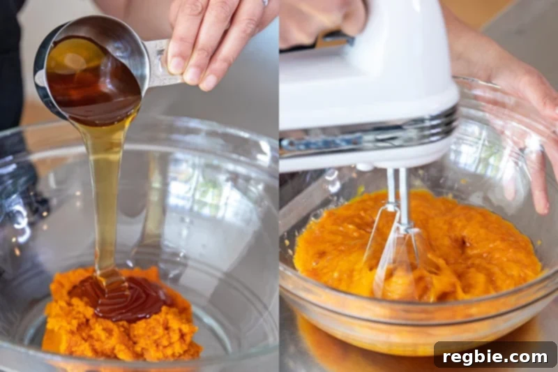 A person is measuring out the wet ingredients for paleo pumpkin muffins into a bowl, then using a hand mixer to thoroughly blend them together, creating a smooth mixture.