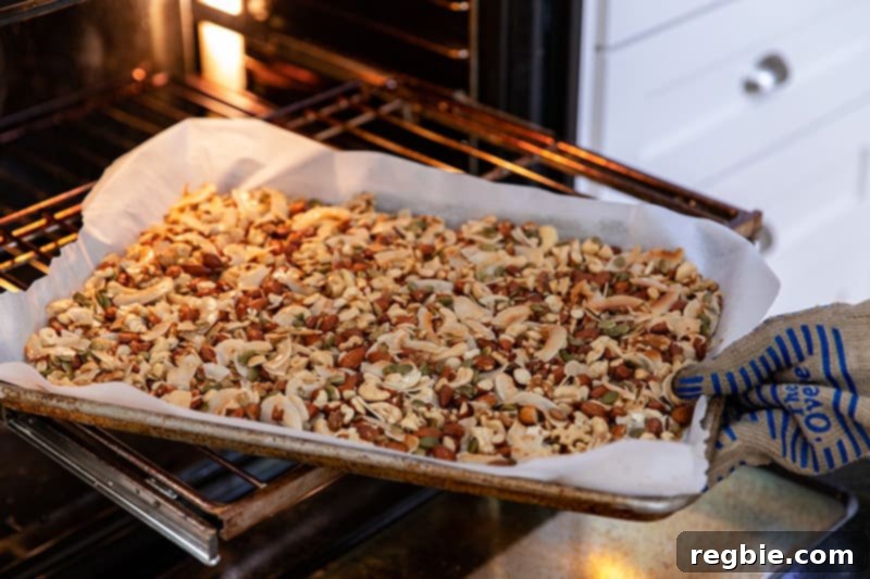Indulgent Chocolate Cherry Granola Paleo Vegan Gluten Free 11 Rotating the tray of chocolate cherry paleo granola at the halfway point of baking to ensure even browning and crispness.