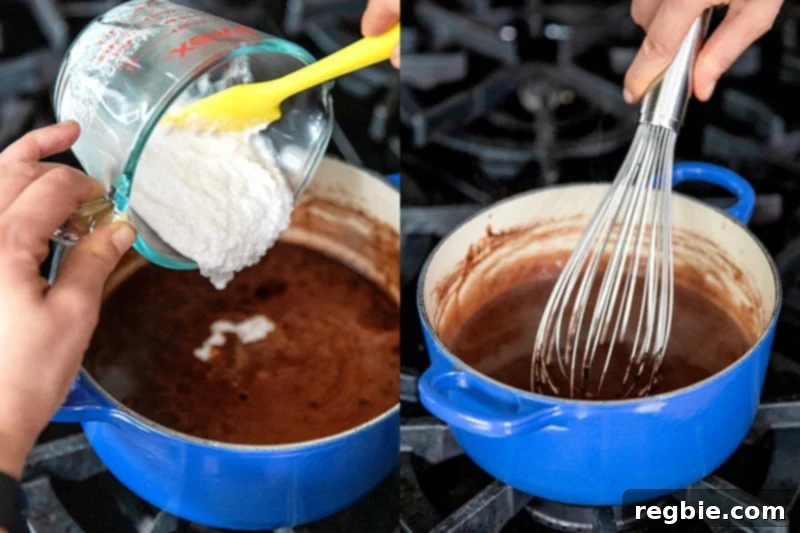 Heavenly Paleo Chocolate Pudding 7 Adding bloomed gelatin and vanilla to the paleo chocolate pudding in the saucepan and whisking it together.