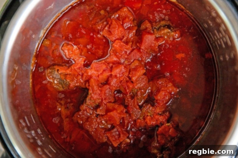 Easy Instant Pot Meat Sauce Whole30 Keto 9 An overhead shot of an open Instant Pot filled with a tomato meat sauce