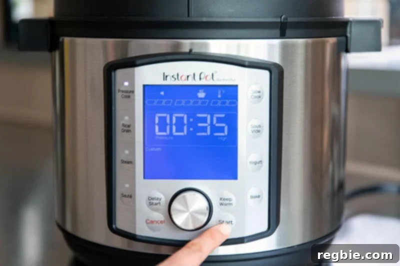Easy Instant Pot Whole30 Keto Pork Stew 10 The display of a 6-quart Instant Pot Duo Evo Plus showing '00:35', indicating it's set to pressure cook.