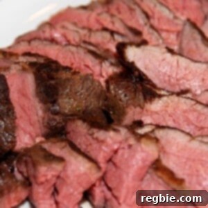 A plate of paleo and Whole30 sous vide grass fed tri-tip roast sliced up.