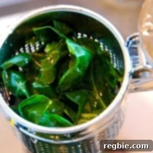 The Ultimate Collard Greens Recipe 2 Deliciously cooked collard greens with a vibrant green color