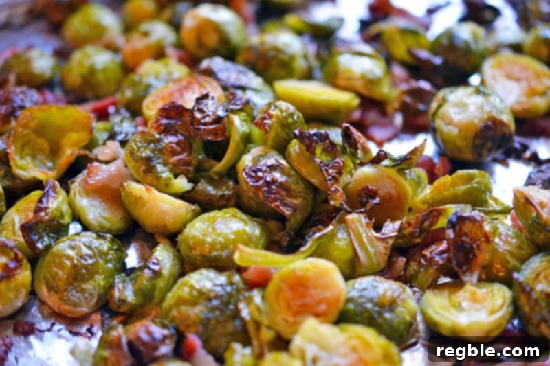 A closeup shot of Roasted Brussels Sprouts and Bacon, highlighting the crispy texture and golden color.