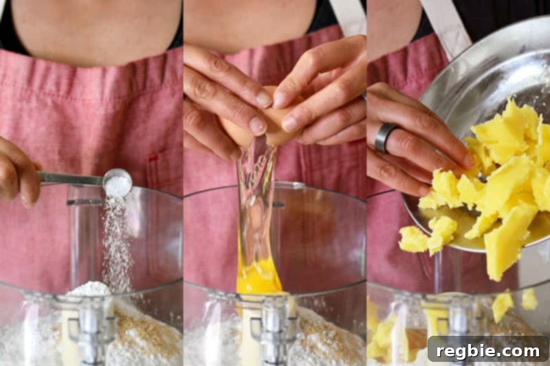 Adding salt, eggs, and chilled ghee into an open food processor filled with cassava flour, tapioca flour, and maple sugar.