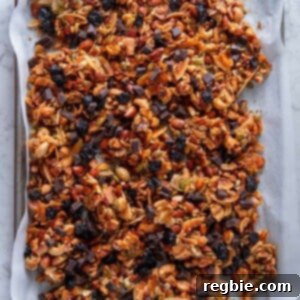 An overhead shot of a tray of chocolate cherry paleo granola, a tasty homemade holiday edible gift.