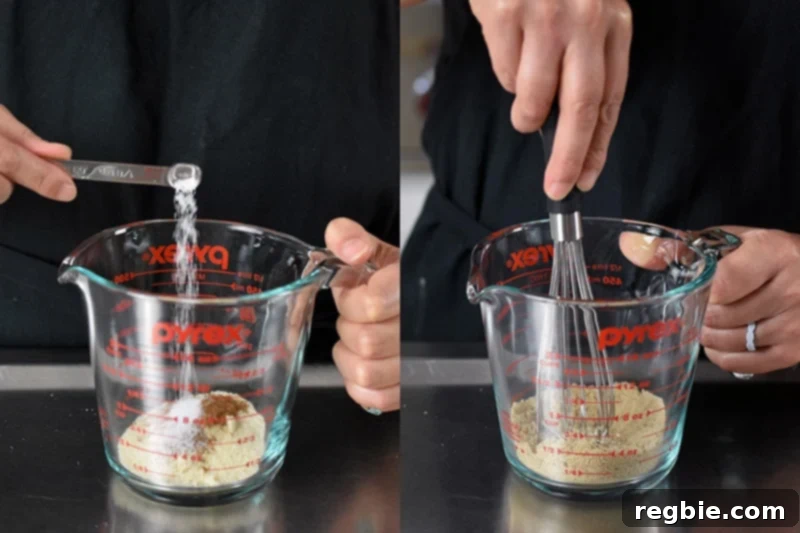 Quick Paleo Gluten-Free Pumpkin Mug Cake 3 Adding the dry ingredients for pumpkin mug cake to a liquid measuring cup and whisking it together.